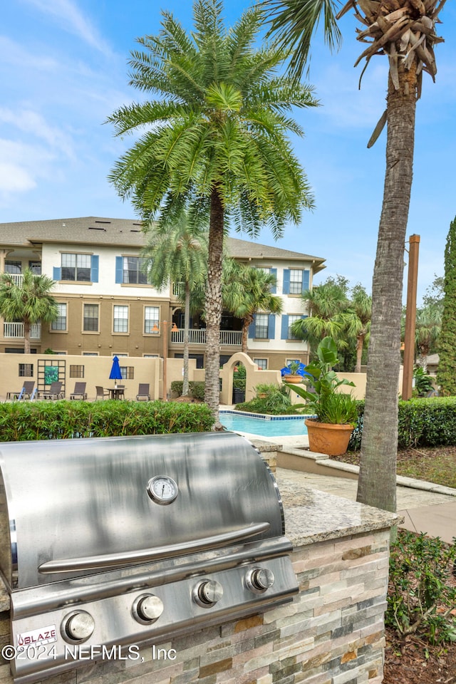 view of property's community featuring a pool