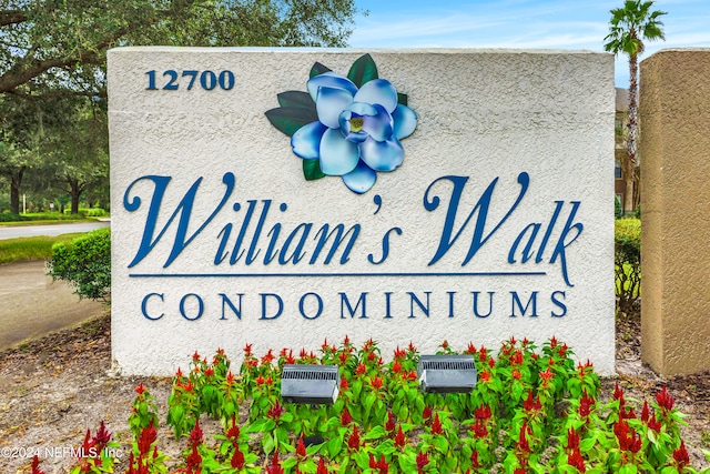 view of community sign