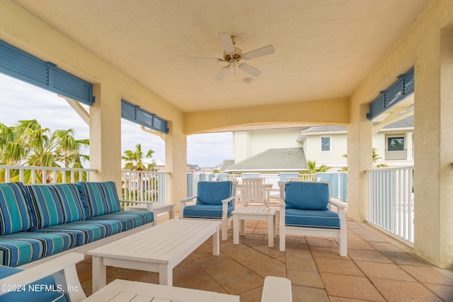 exterior space with a ceiling fan and an outdoor hangout area