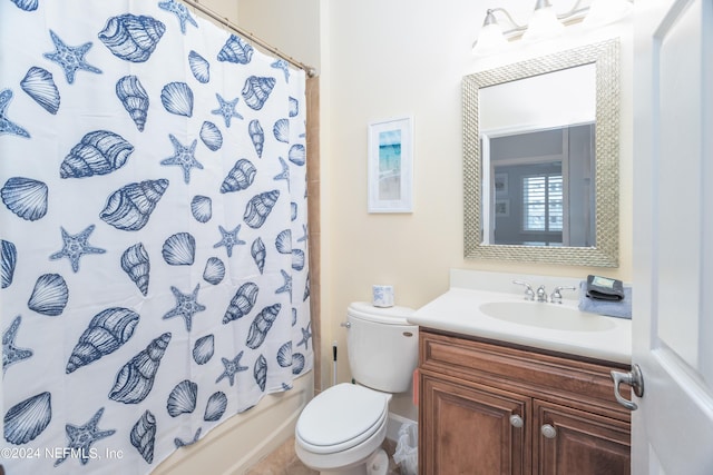 full bath with vanity, shower / bath combo with shower curtain, and toilet