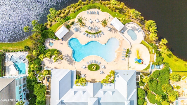 birds eye view of property featuring a water view