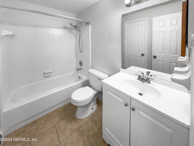 full bathroom with toilet, tile patterned flooring, vanity, and shower / bath combination