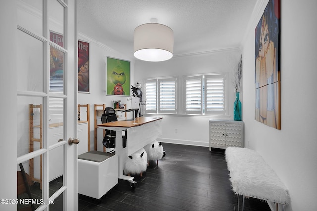 office space with ornamental molding, dark hardwood / wood-style floors, and a textured ceiling