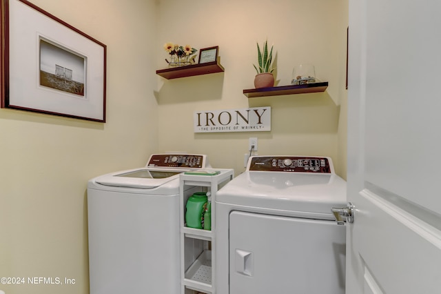 laundry room with independent washer and dryer