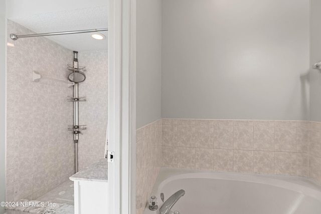 bathroom featuring a tub to relax in