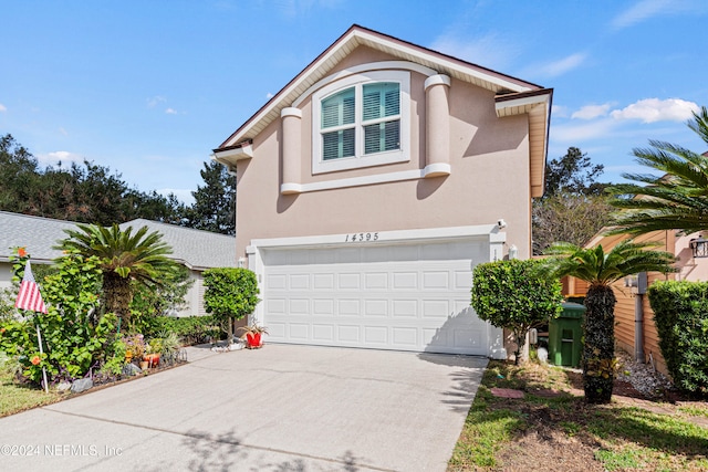 view of property featuring a garage