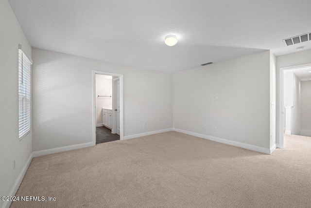 unfurnished room with carpet