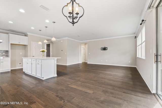 kitchen featuring a center island, white cabinets, decorative light fixtures, and dark hardwood / wood-style floors