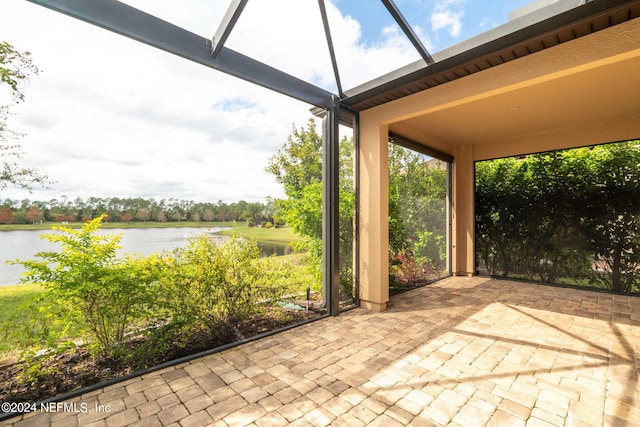 view of patio featuring a water view