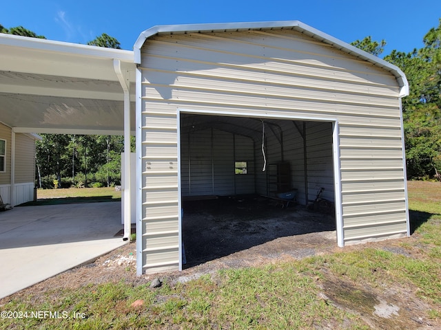 garage with a carport