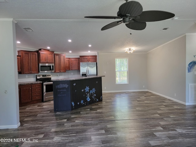 kitchen with appliances with stainless steel finishes, crown molding, a kitchen island with sink, and dark wood-type flooring