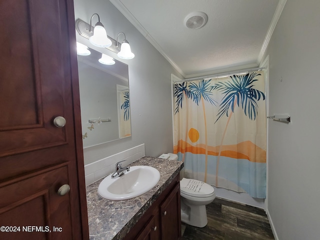 full bathroom featuring toilet, crown molding, vanity, and wood-type flooring