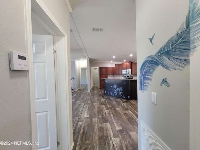 hall with dark wood-type flooring