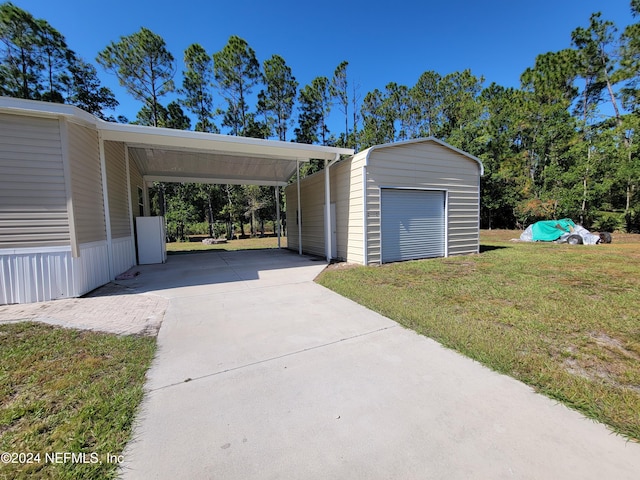 garage featuring a yard