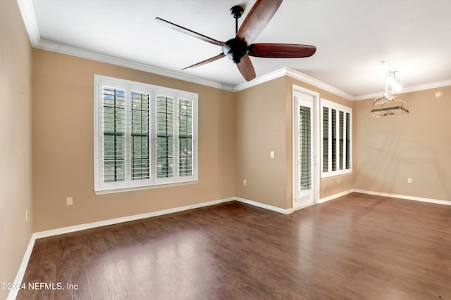 spare room featuring ceiling fan, crown molding, and dark hardwood / wood-style floors