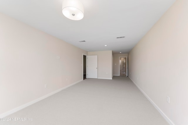 empty room with carpet flooring