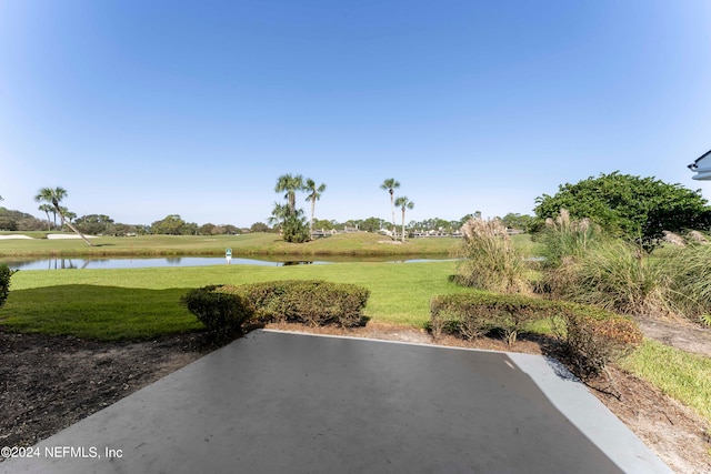 view of patio / terrace with a water view