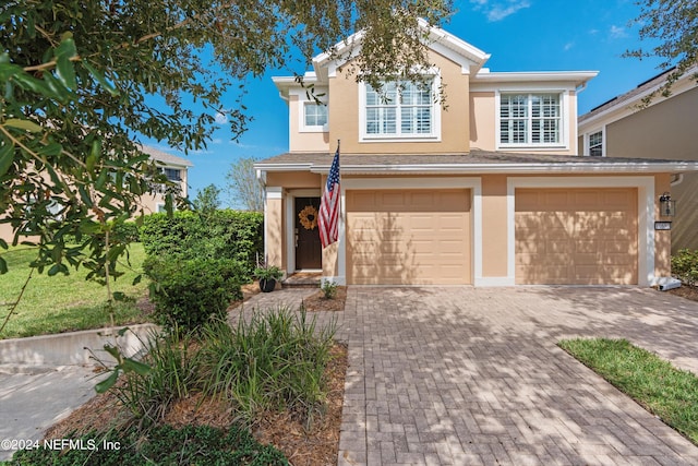 view of front of home with a garage