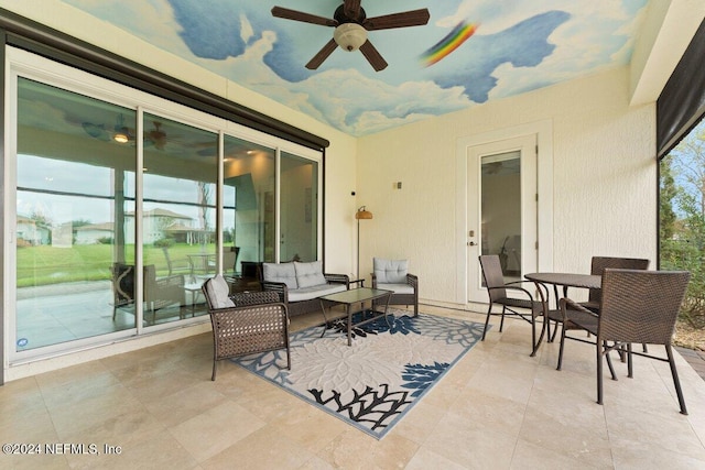 view of patio with ceiling fan and an outdoor hangout area