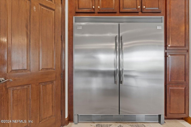 kitchen with stainless steel built in fridge