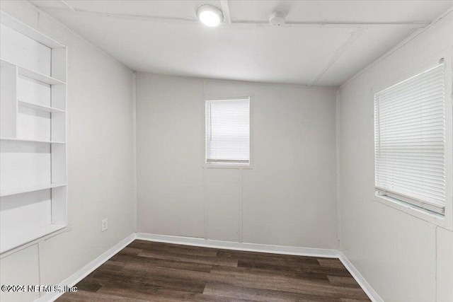 empty room featuring dark hardwood / wood-style floors