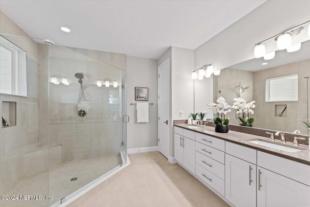 244 Rum Runner Way, Saint Johns, FL 32259 - full bathroom with a shower stall, tile patterned floors, double vanity, and baseboards