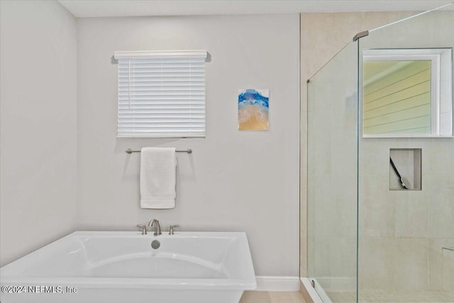244 Rum Runner Way, Saint Johns, FL 32259 - bathroom featuring a shower stall and a freestanding tub