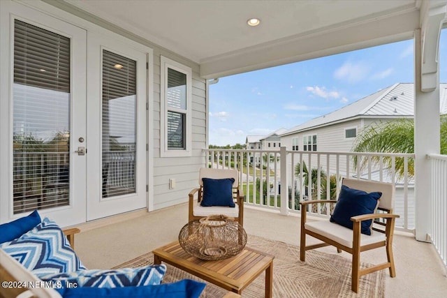 balcony featuring french doors