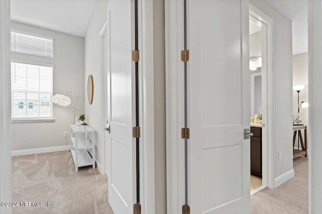 244 Rum Runner Way, Saint Johns, FL 32259 - hall featuring light carpet and baseboards