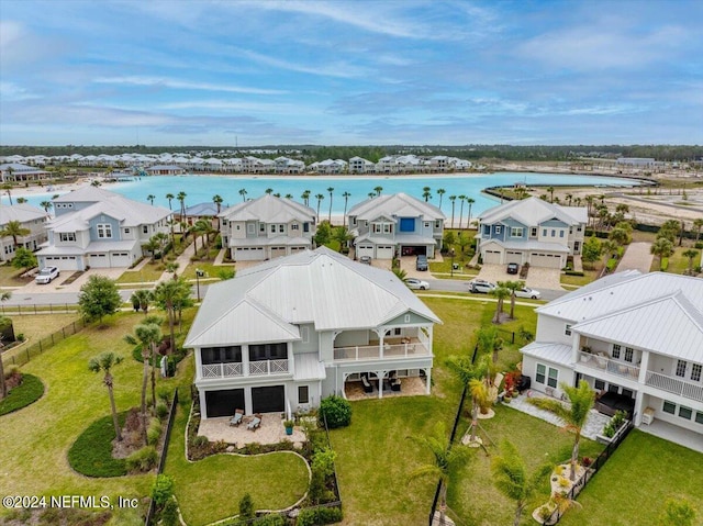 drone / aerial view with a water view