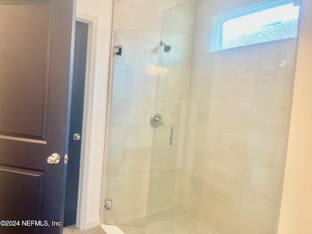 bathroom with an enclosed shower