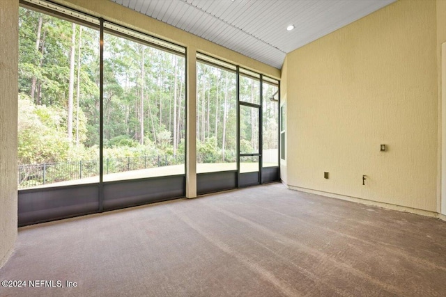 unfurnished sunroom featuring a healthy amount of sunlight