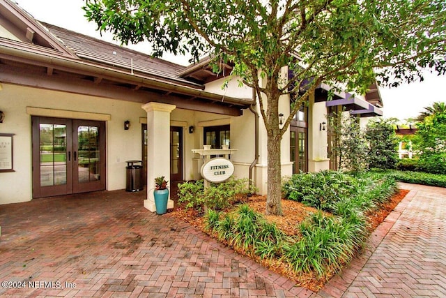 view of exterior entry with french doors