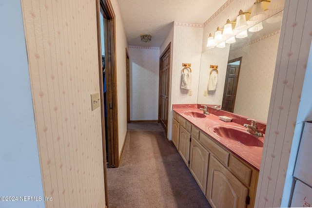 6706 Baja Ct, Keystone Heights, FL 32656 - bathroom featuring wallpapered walls, a sink, and double vanity