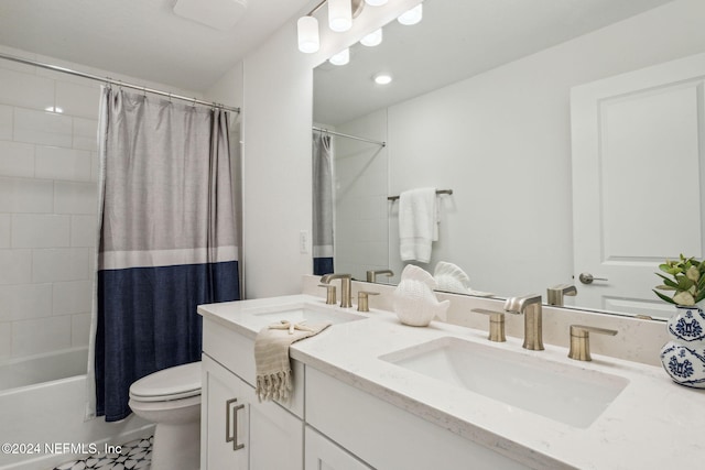 full bathroom with vanity, shower / bath combination with curtain, and toilet