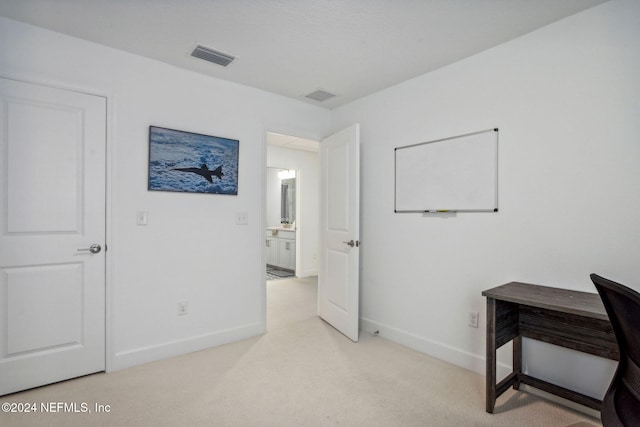 interior space featuring light colored carpet