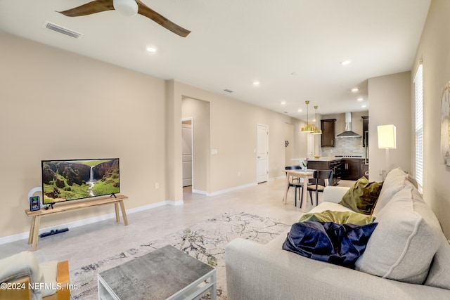 living room with ceiling fan