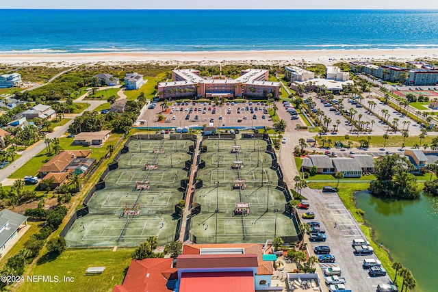 4 Ocean Trace Rd Unit 102, Saint Augustine, FL 32080 - drone / aerial view with a view of the beach and a water view