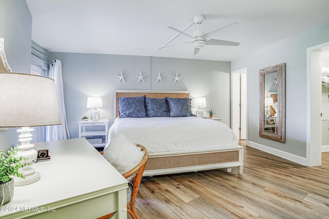 4 Ocean Trace Rd Unit 102, Saint Augustine, FL 32080 - bedroom with baseboards, wood finished floors, and ceiling fan