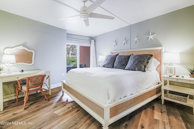 bedroom with ceiling fan, hardwood / wood-style flooring, and access to exterior