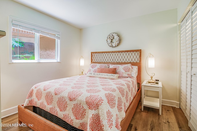 4 Ocean Trace Rd Unit 102, Saint Augustine, FL 32080 - bedroom with wood finished floors and baseboards
