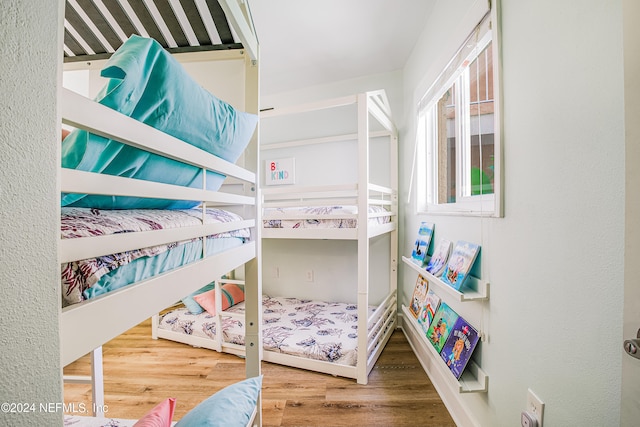 bedroom featuring hardwood / wood-style flooring