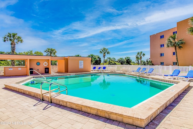 view of pool with a patio