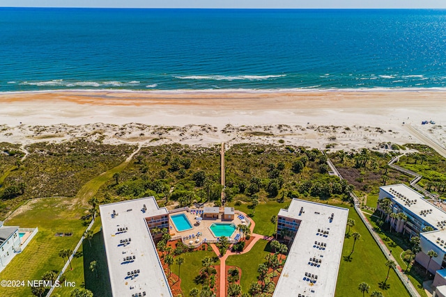 bird's eye view with a view of the beach and a water view