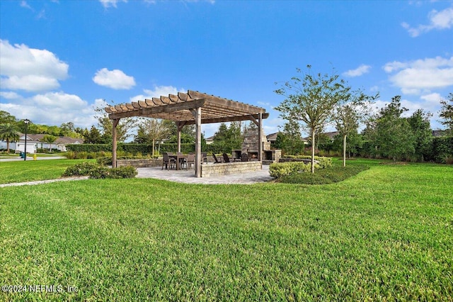 view of yard with a pergola and a patio