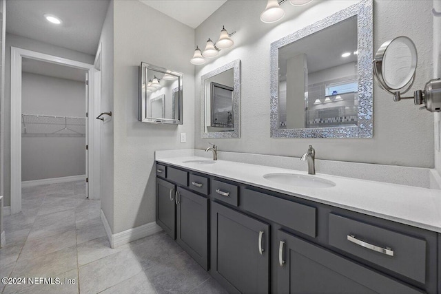 bathroom featuring vanity and tile patterned flooring