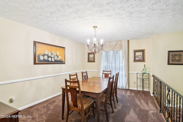 dining space with an inviting chandelier, a textured ceiling, and dark carpet