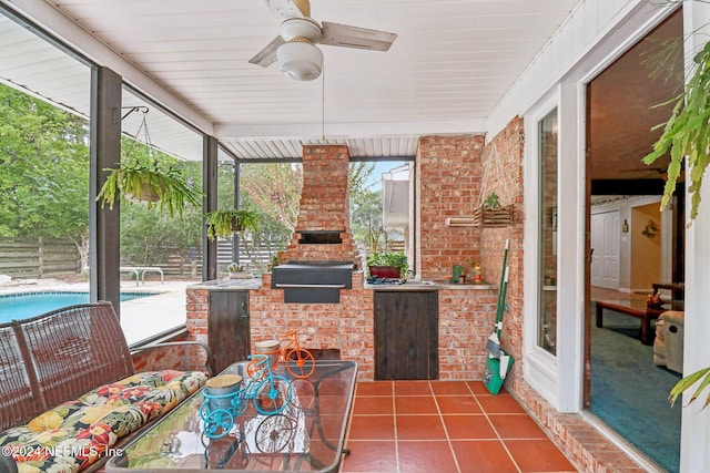 sunroom / solarium with ceiling fan