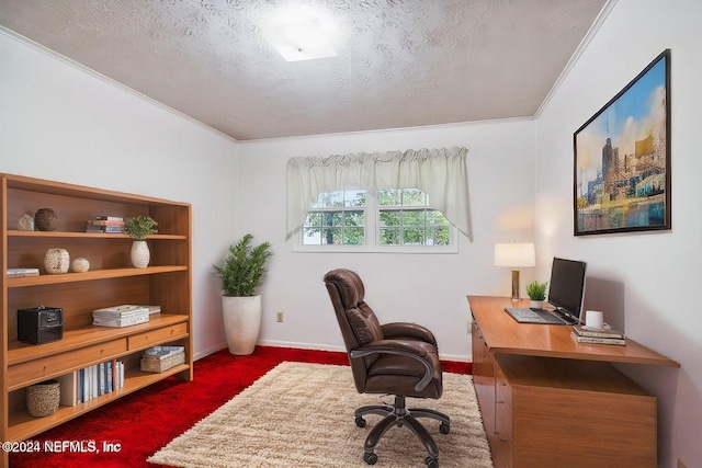 office space with ornamental molding, dark colored carpet, and a textured ceiling