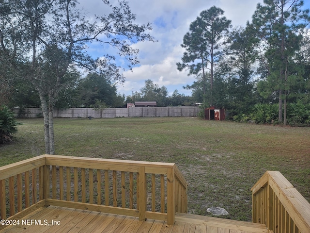 view of yard featuring a deck